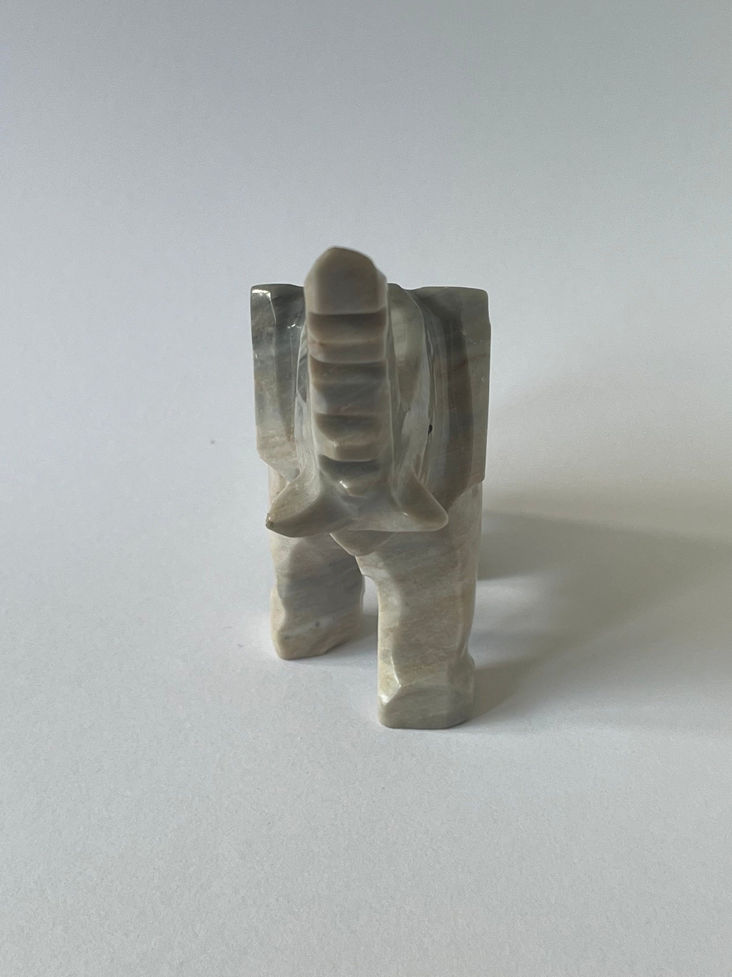 Stone Elephant Sculpture on a white background